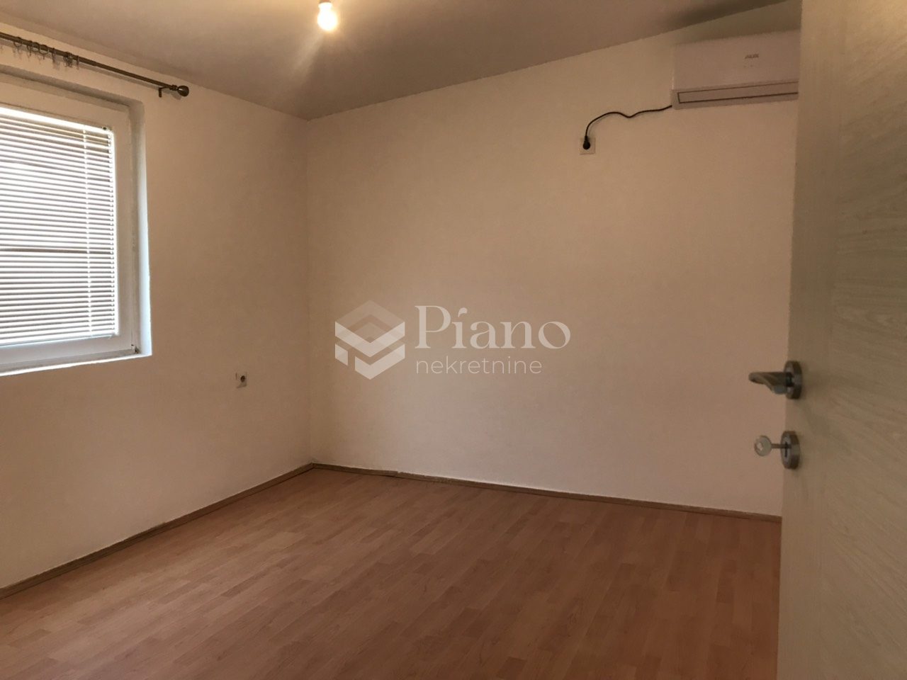 Unfurnished one bedroom apartment in front of Catholic church