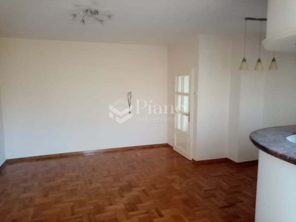 Unfurnished three bedroom apartment in city center